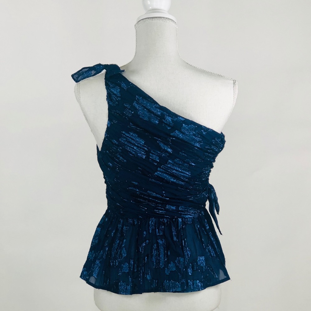 One shoulder top.